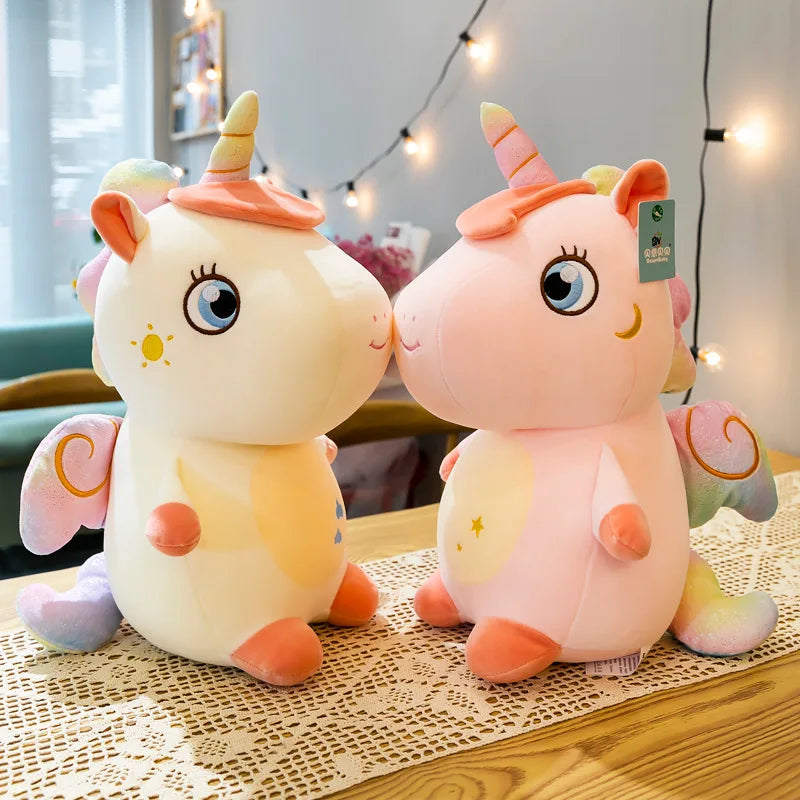 Peluche licorne assise