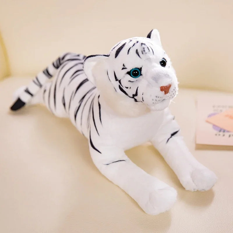 Peluche tigre blanc douce sur un tapis