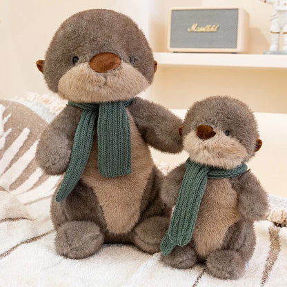 Peluche loutre avec écharpe