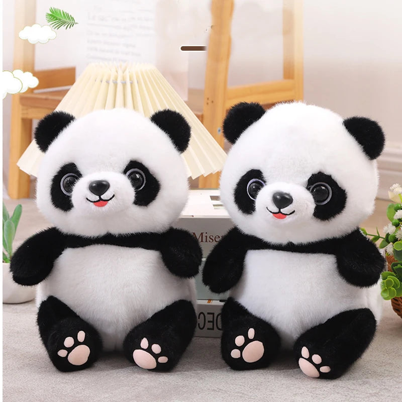 Deux peluches panda mignonne sur moquette