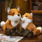 Deux peluches renards domestique