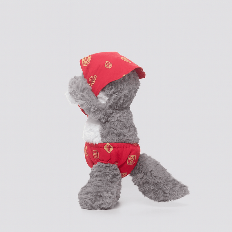 La peluche loup du petit chaperon rouge se cachant les yeux de coter sur fond blanc