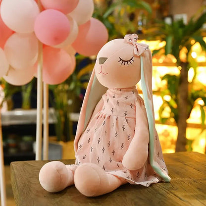 Peluche lapin endormi