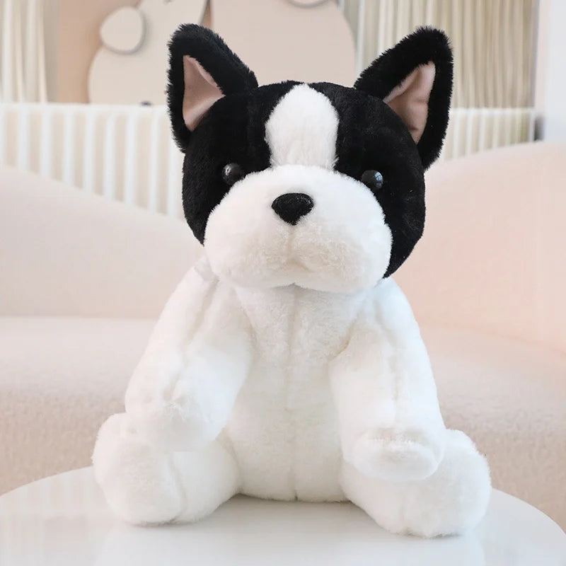 Peluche chien blanc Bouledogue Français sur canape