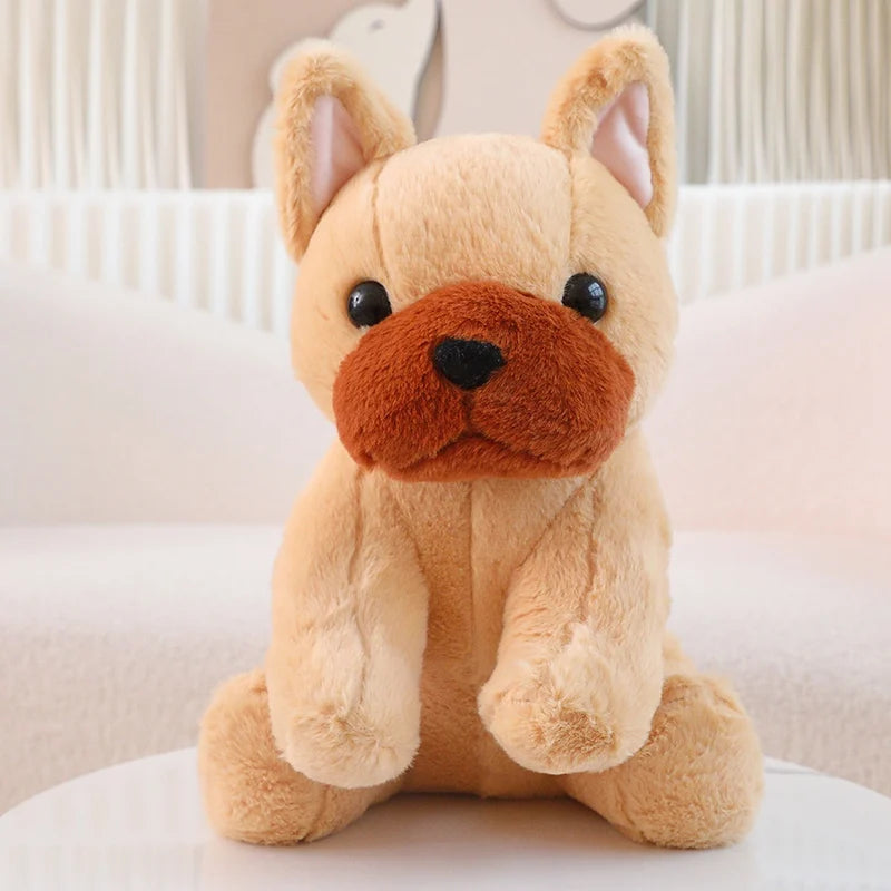 Peluche chien brun Bouledogue Français sur canape