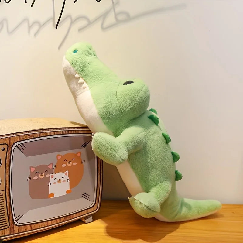 Peluche crocodile kawaii sur une télévision en jouet