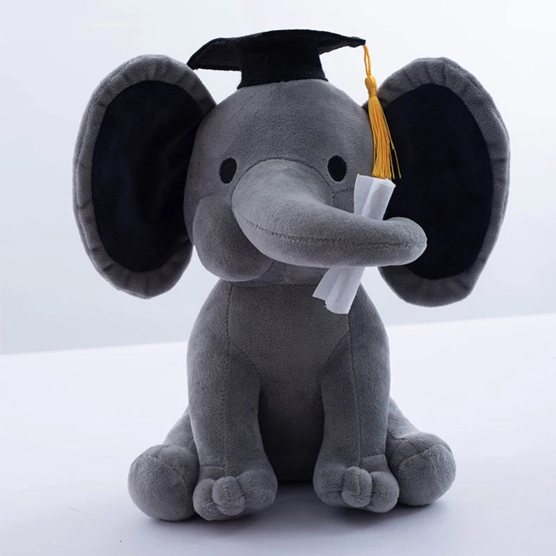 Peluche éléphant gris diplômé sur fond blanc
