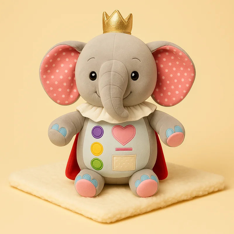 Peluche Éléphant Roi sur une couverture