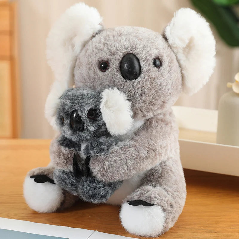 Peluche koala mère et fille sur un meuble