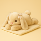 Peluche lapin couché