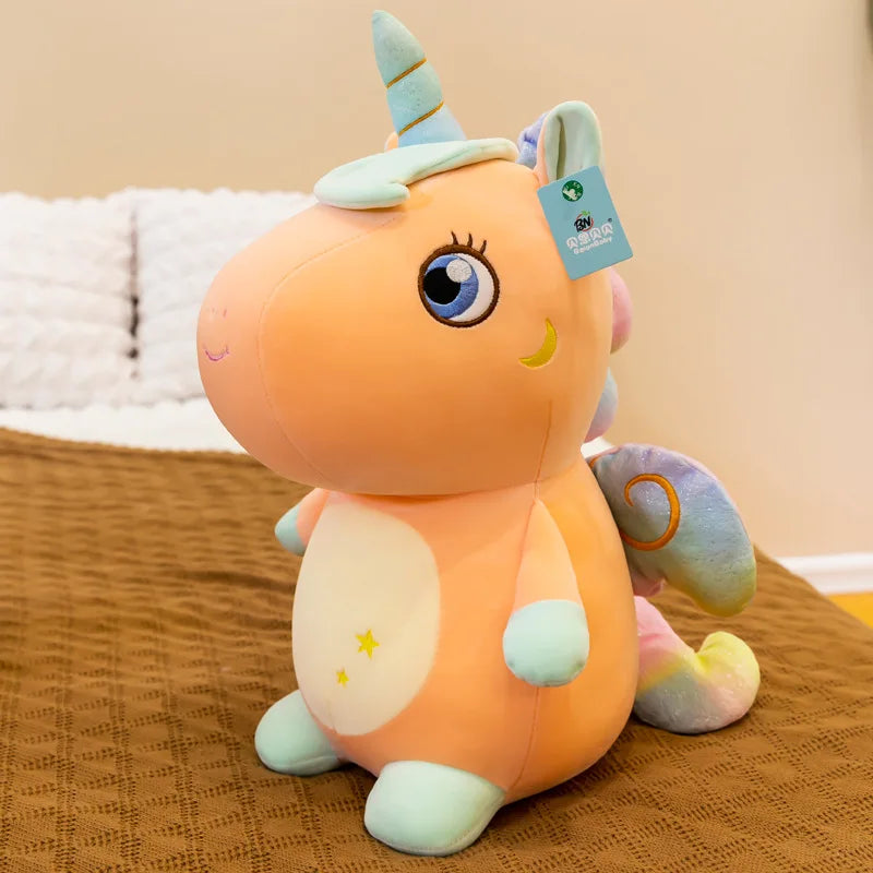 Peluche licorne assise
