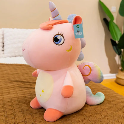 Peluche licorne assise