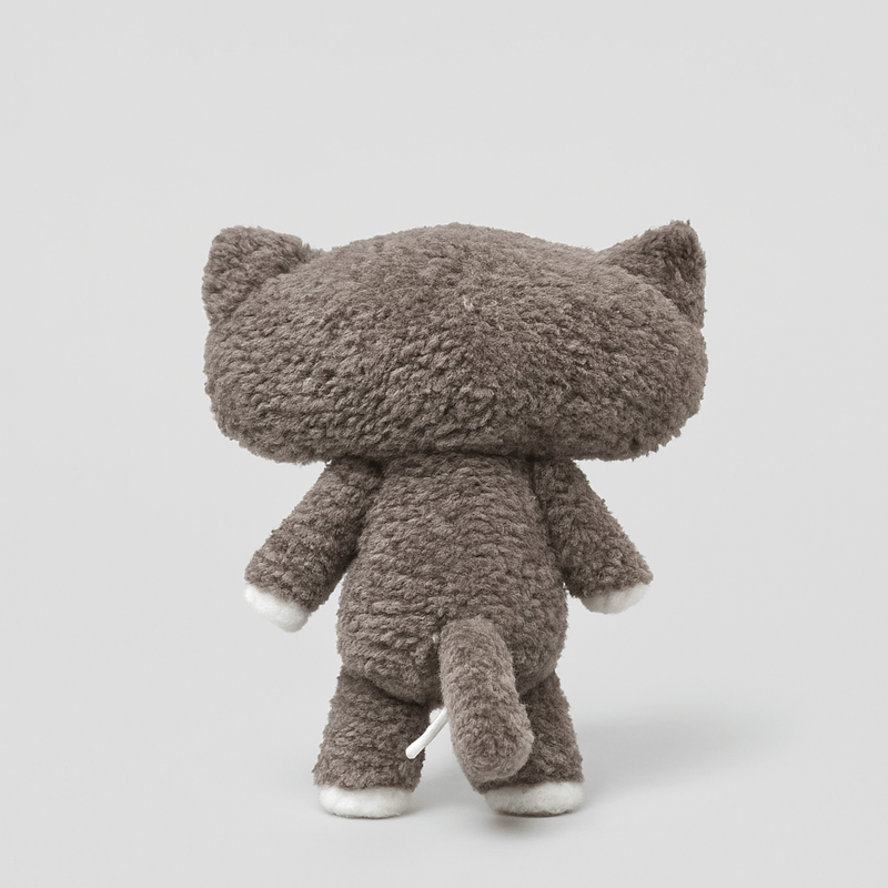 Peluche loup de conte de fées de dos sur fond gris