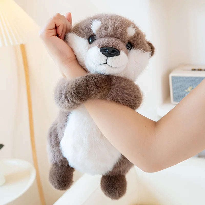Peluche loutre à câliner