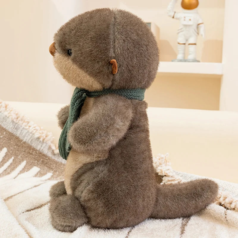 Peluche loutre avec écharpe