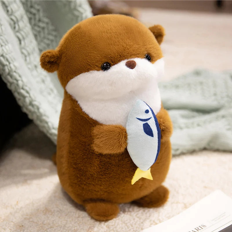 Peluche loutre avec son poisson