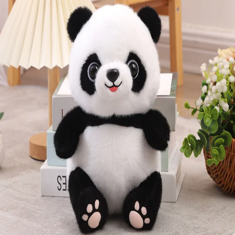 Peluche panda mignonne assise sur moquette