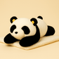 Peluche panda xxl sur couverture