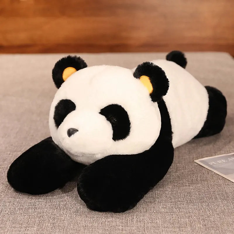 Peluche panda xxl sur tapis