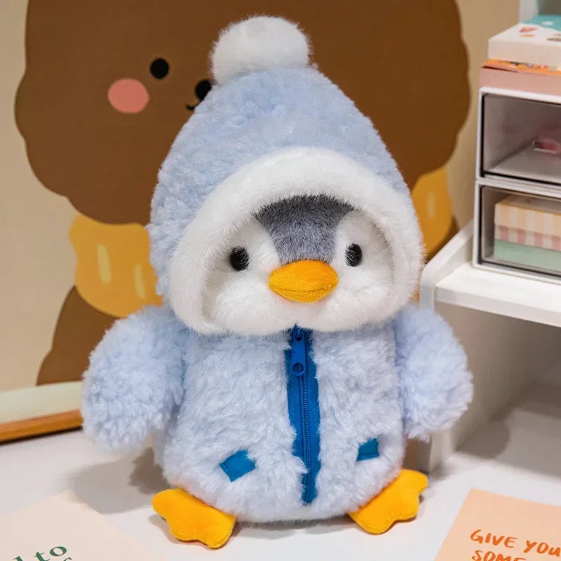 Peluche pingouin avec une doudoune