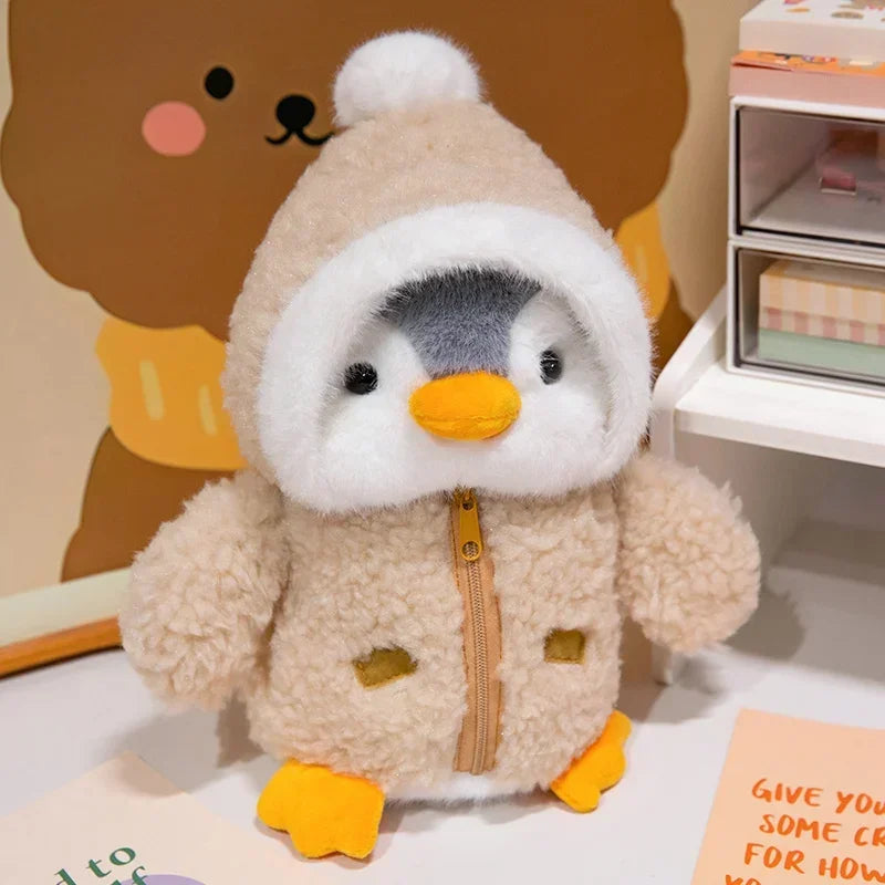 Peluche pingouin avec une doudoune