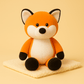 Peluche renard moelleuse sur couverture