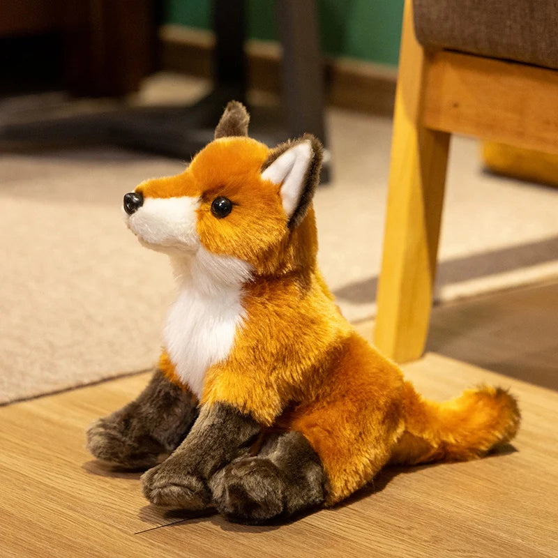 Peluche renard sauvage sur un parquet