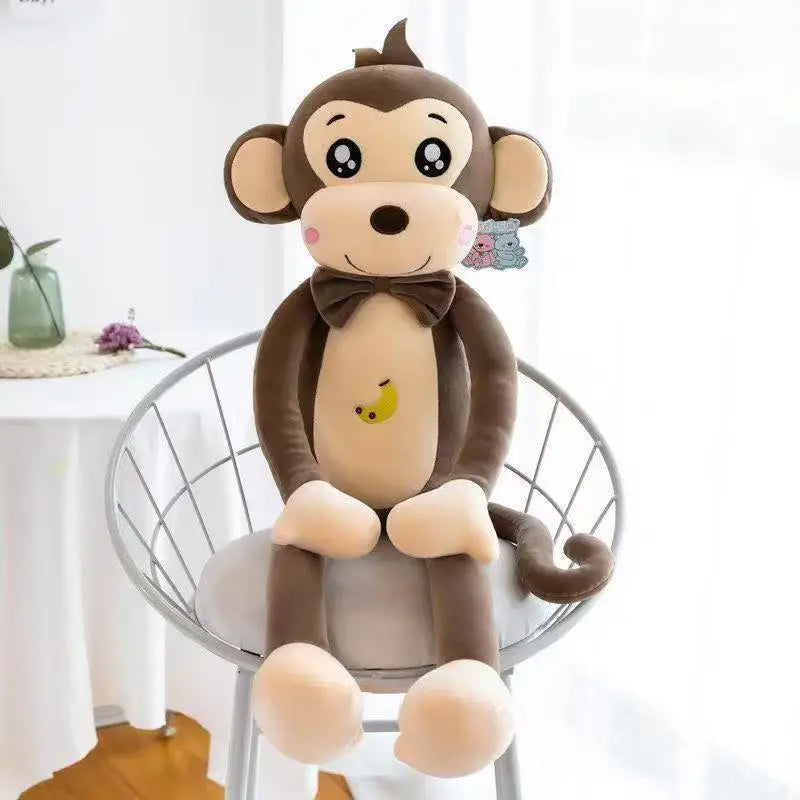 Peluche singe marron cartoon sur une chaise