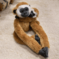 Peluche gibbon mère et fils sur un tapis