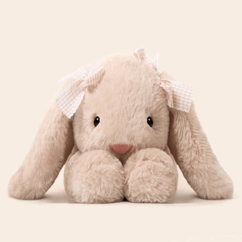 Peluche lapin couché