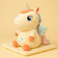 Peluche licorne assise