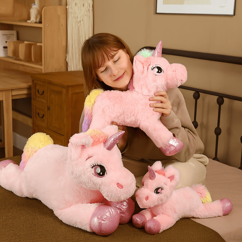 Grande peluche licorne rose